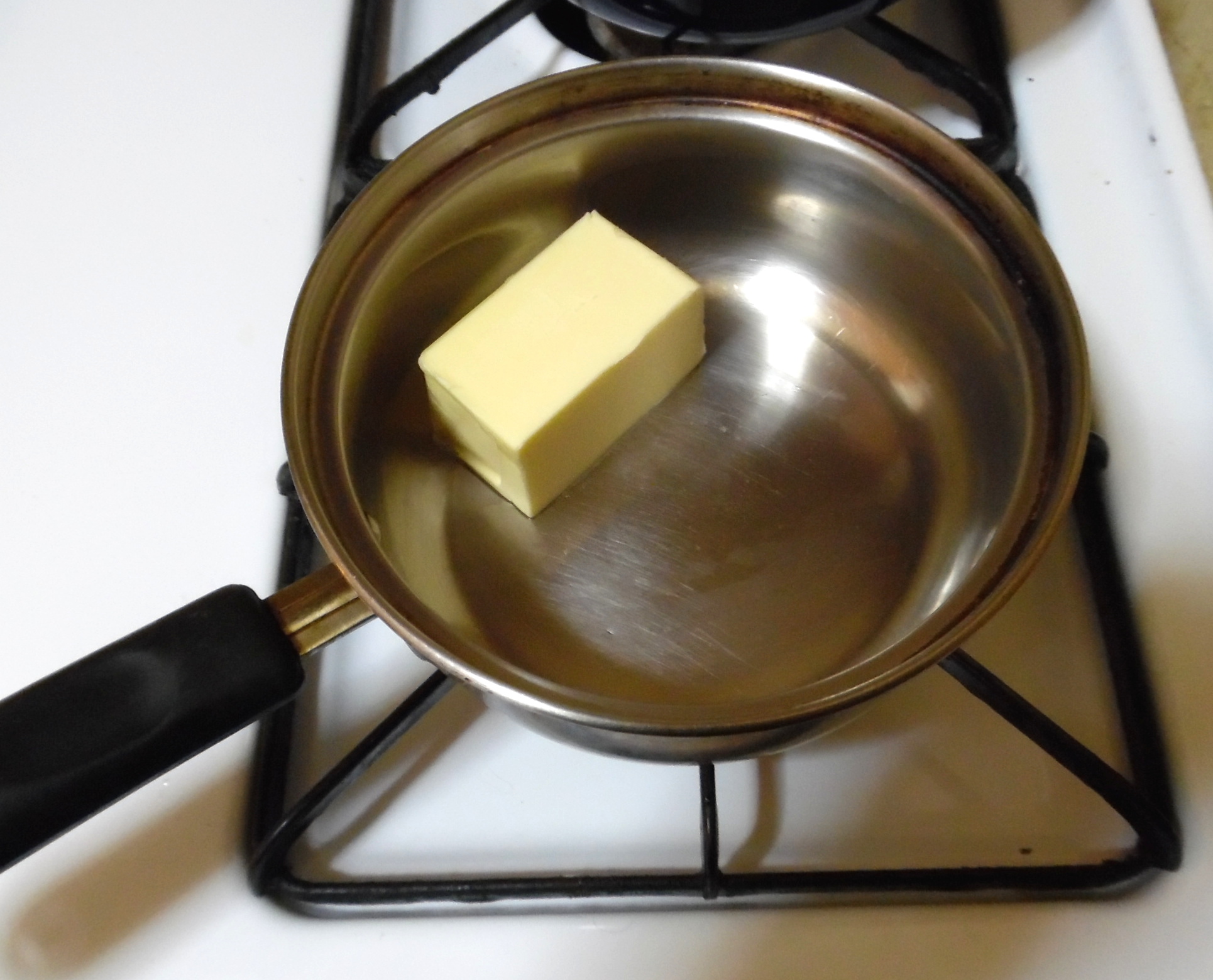 Butter, in saucepan.