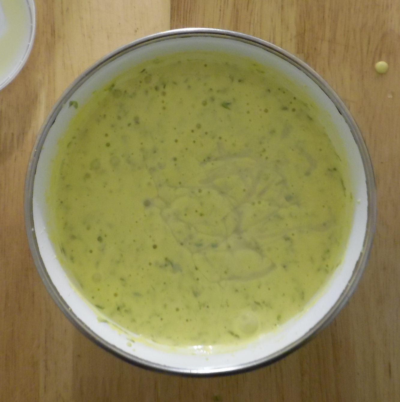 Adding the lime juice and sweetened condensed milk. Adding the lime juice and sweetened condensed milk.