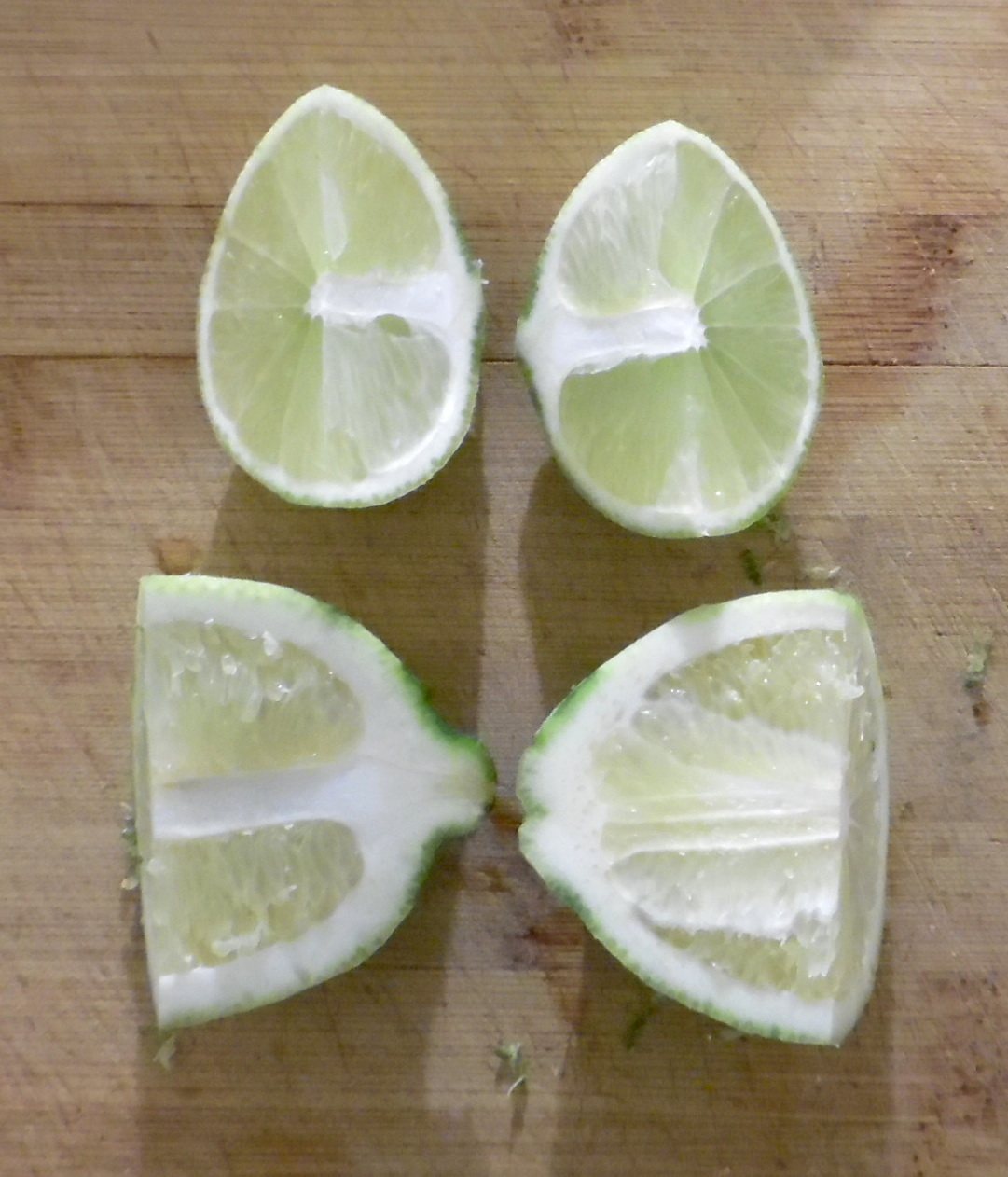 Limes quartered for juicing.